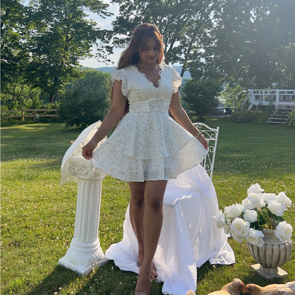 White Mini Fit and Flare Sundress with Flutter Sleeves and V-Neck